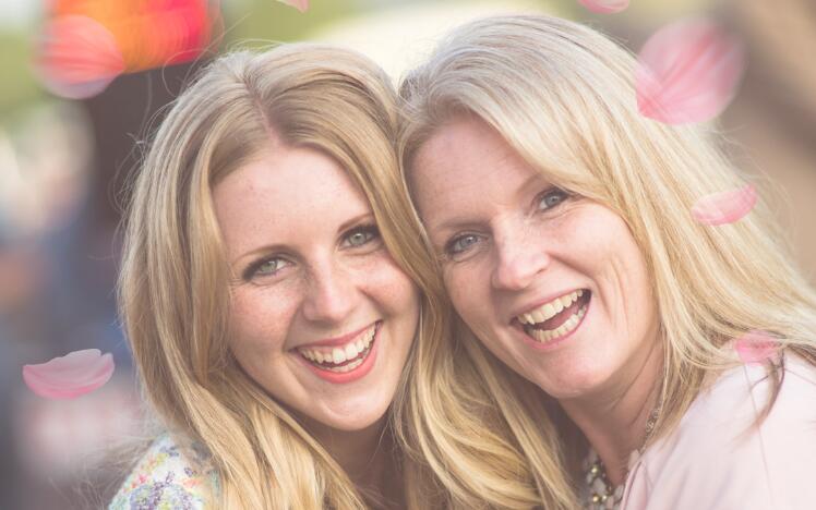 Mother and daughter enjoying the races