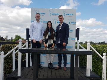 Students pose for a photo at Worcester Racecourse