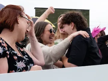 A group of friends celebrating a win at Worcester Racecourse