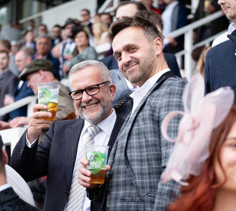 Two gents in the grandstand crowd at Worcester Racecourse