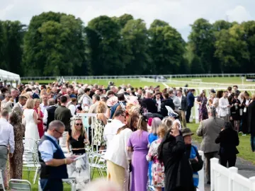 Crowds at Worcester relaxing in between races